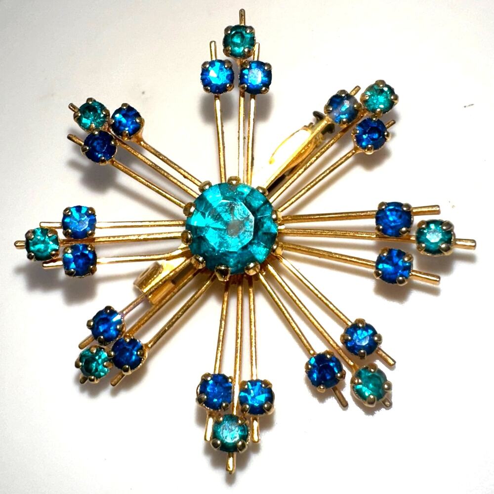 Vintage 1950s gold tone blue teal rhinestones starburst Sputnik brooch